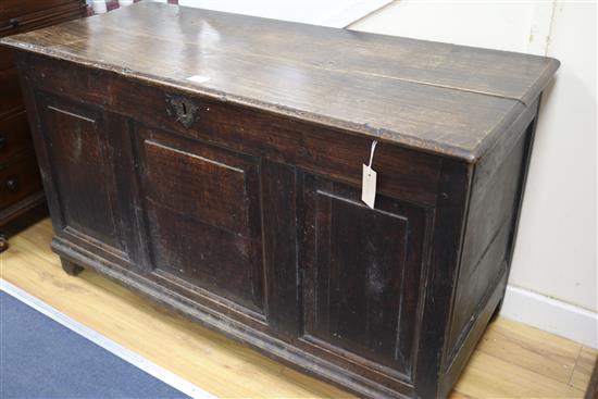 An 18th century oak coffer, W.121cm